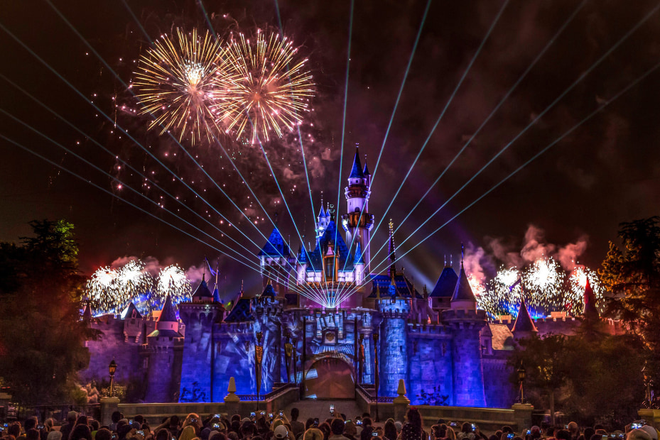 Fireworks sparkle over Sleeping Beauty's Castle in Disneyland Park.