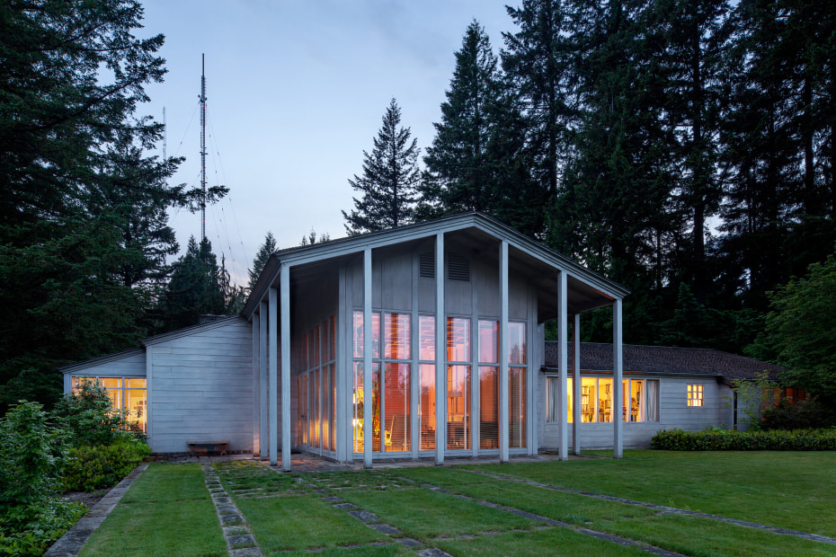 Exterior of Watzek House at dusk.