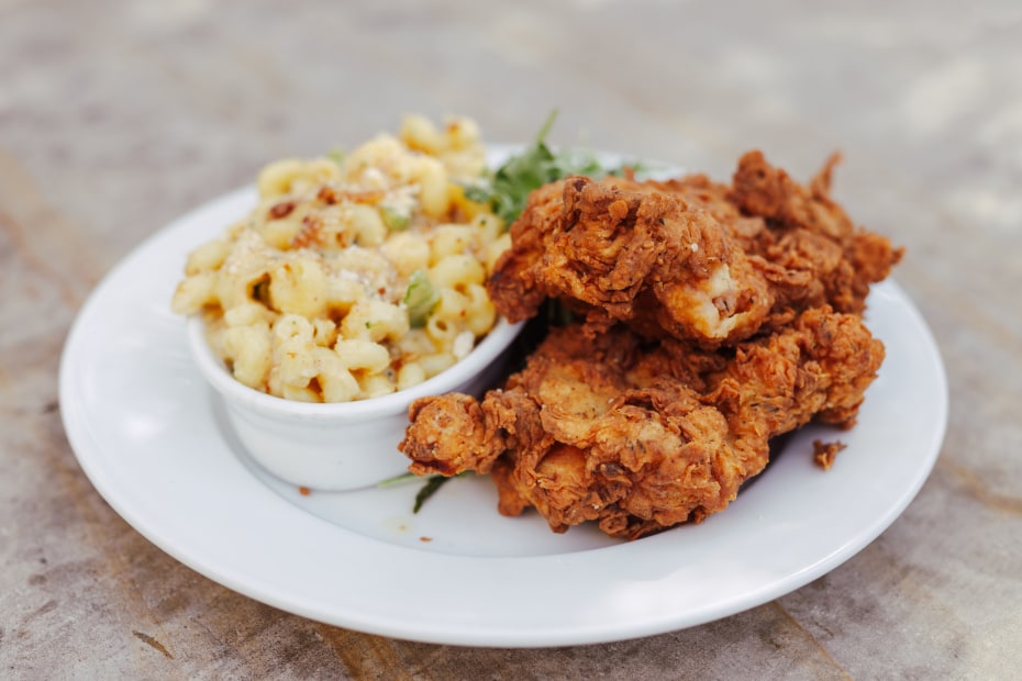 Fried chicken with a side of mac and cheese on a plate at Union Pub in Volcano, California.