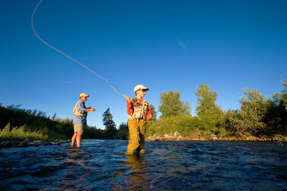 A father and son flyfish on the Wind River outside of Dubois, Wyoming.