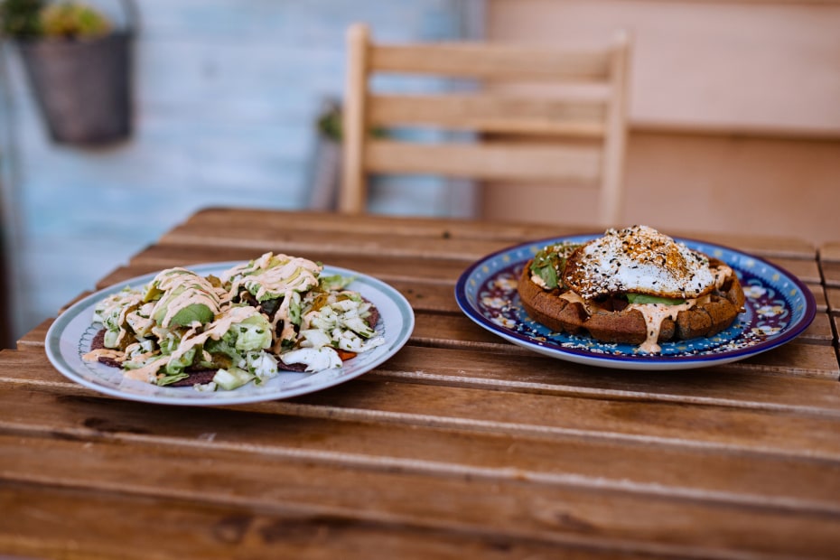 Plates on a table out on the Hidden Kitchen patio.