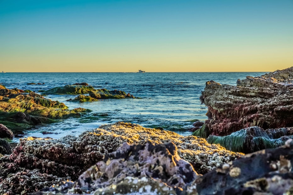 Tide pools at sunset at Crystal Cove State Park, Laguna Beach, California.