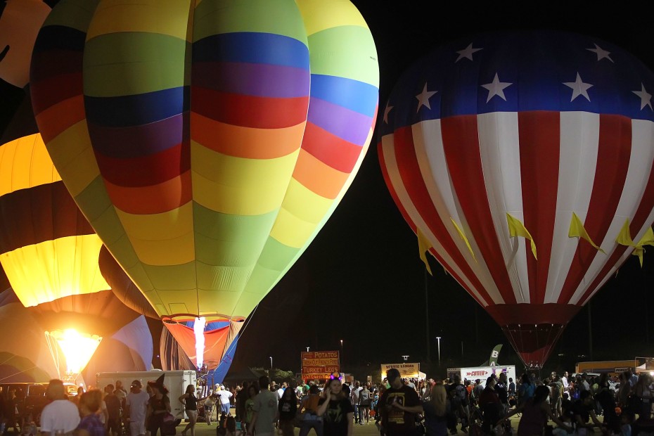 Hot air balloons rise over the Spooktacular Hot Air Balloon Festival in Scottsdale, Arizona.