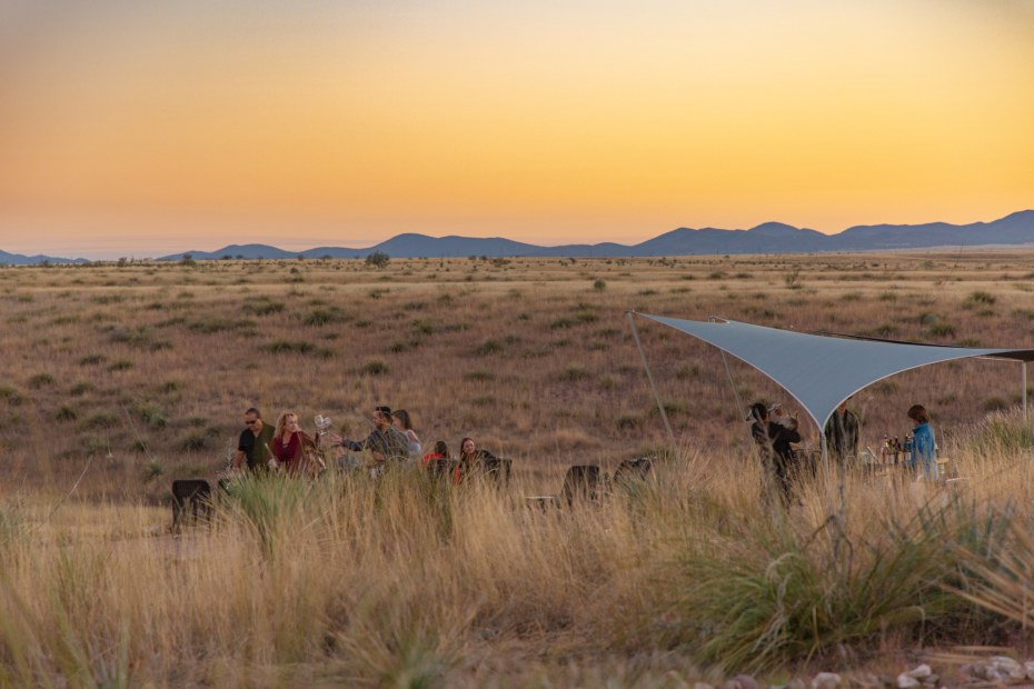 Off-grid wine tasting area at Rune Wines in Sonoita, Arizona at sunset.