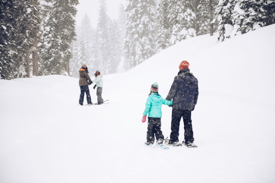 A family snowshoe on a trail at Northstar California Resorts in Tahoe.