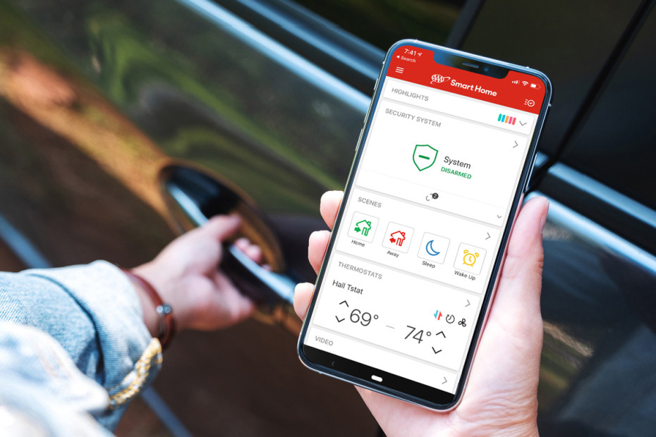 AAA Member checks on their home security system from their phone.