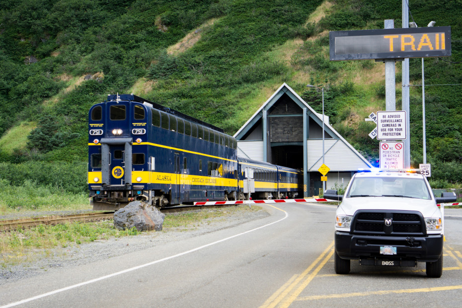 A train exits the Anton Anderson Memorial Tunnel in Whittier, Alaska.