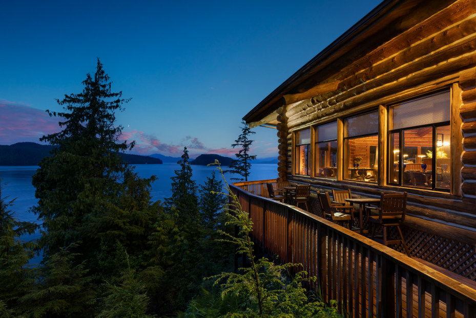 The deck at Salmon Falls Resort in Ketchikan, Alaska at dusk.