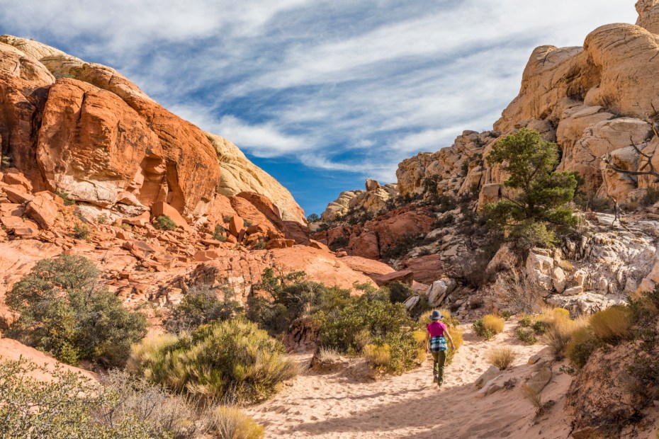 A woman hikes through Red Rock Canyon National Conservation Area, Nevada.