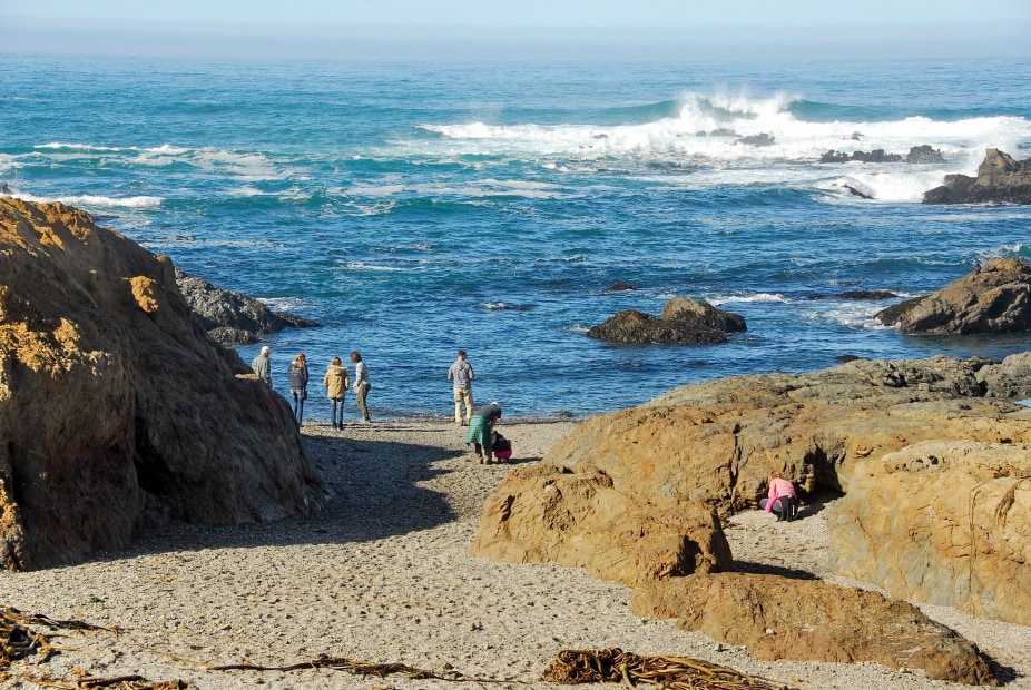 People hunting for sea glass on Glass Beach in MacKerricher State Park in Fort Bragg, CA.