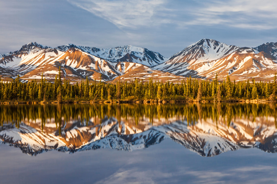 Sunrise over a lake near Cantwell along Denali Highway in Alaska.