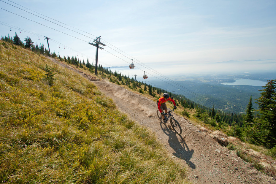 A mountain biker takes the Summit Trail at Whitefish Mountain Resort. 