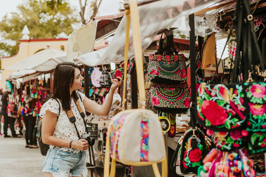 A woman shops at a market in Mexico.