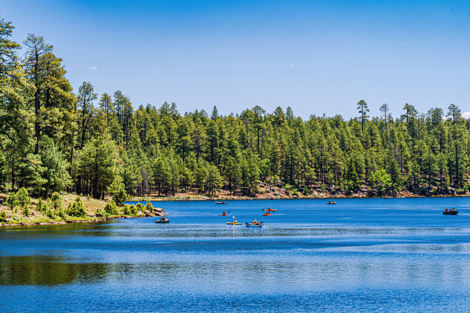 People play on the water at Woods Canyon Lake in Payson, Arizona.
