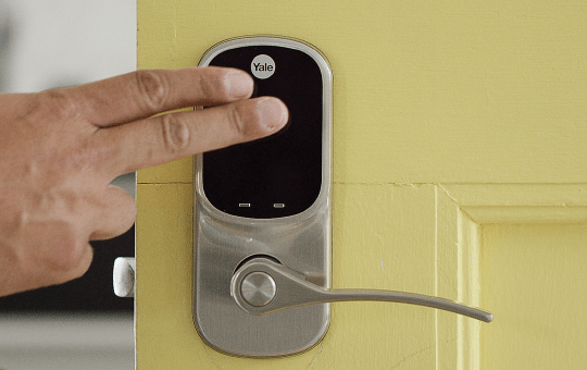 Power up the device by placing your hand on the keypad