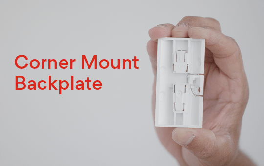 Corner mount backplate