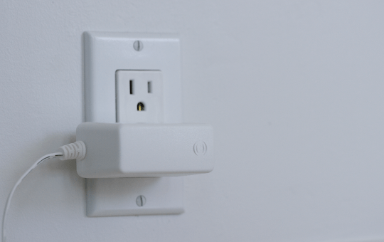 Power adaptor plugged to outlet