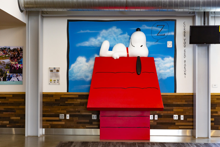 Snoopy lies on his red doghouse at the Sonoma County airport. 