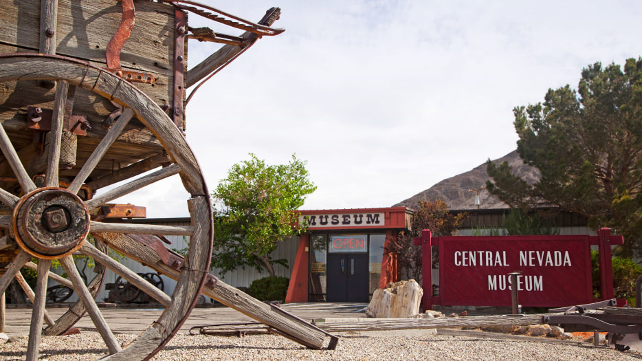 A historic wooden wagon outside the Central Nevada Museum.