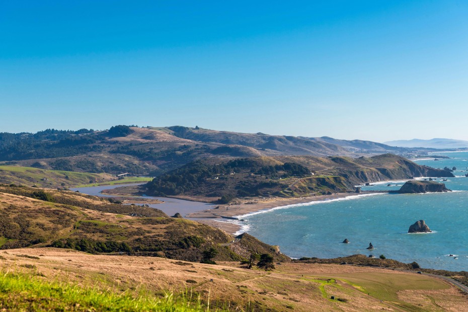 A view a top the Jenner Headlands Trail looking south to the Russian river mouth, entering the Pacific Ocean.