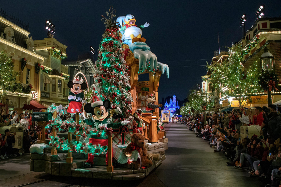 Minnie Mouse, Mickey Mouse, and Donald Duck on a float in the "A Christmas Fantasy Parade” at Disneyland.