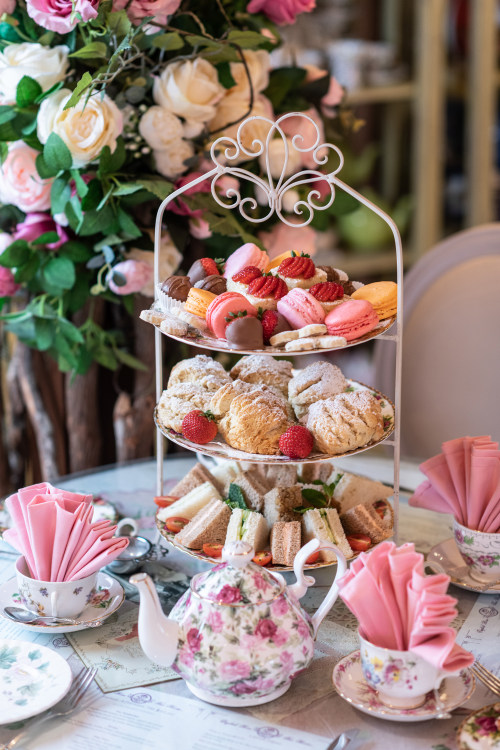 treats sit on a three tiered tray on a table at English Rose Tea Room in Carefree, Arizona.