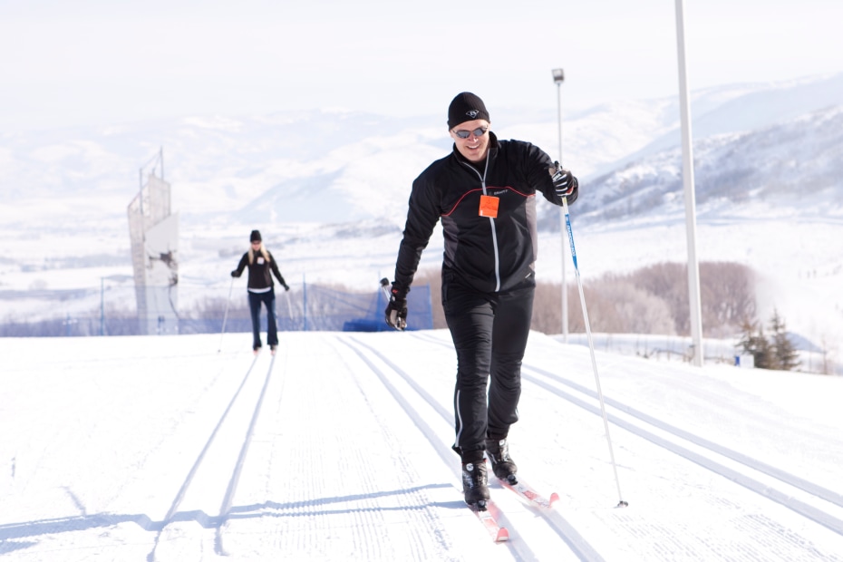 Cross-country skiers on a trail at Soldier Hollow Nordic Center in Utah.