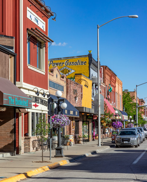 Main Street in downtown Kalispell, Montana on a sunny day.