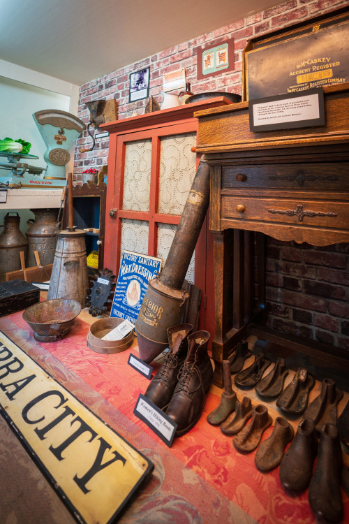 Shoes and other historic items line a room inside the Kentucky Mine Historic Park and Museum in Sierra City, California.