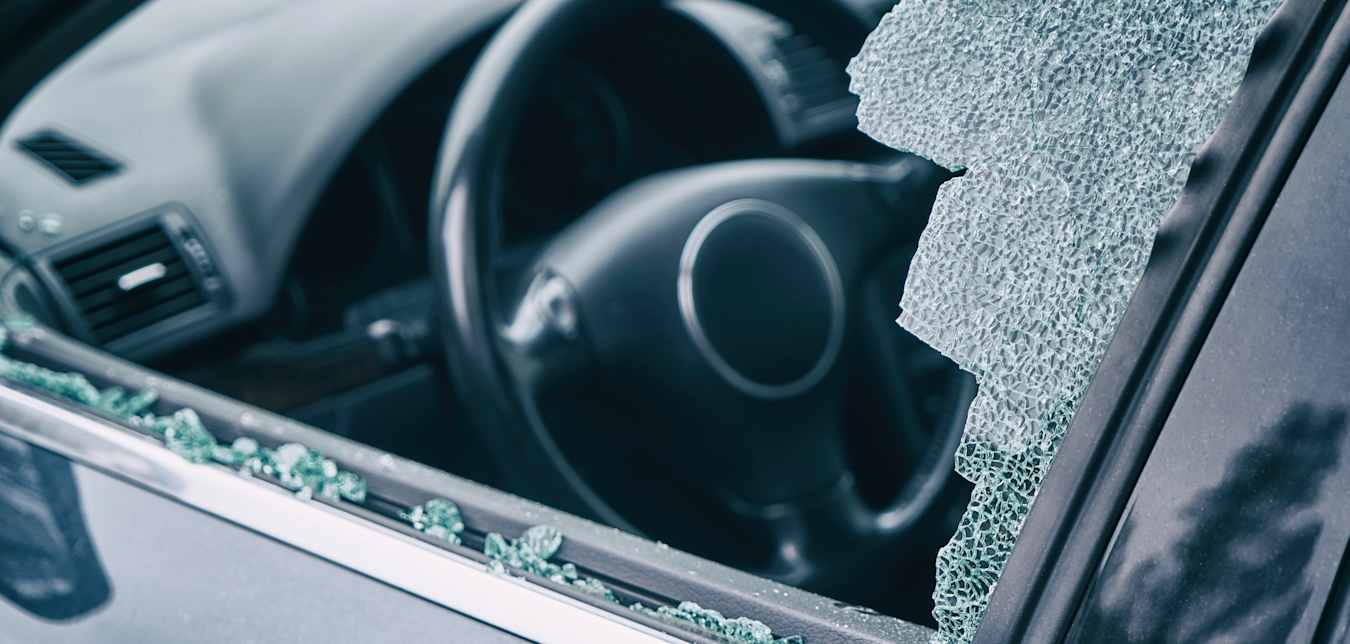 a shattered driver's side car window