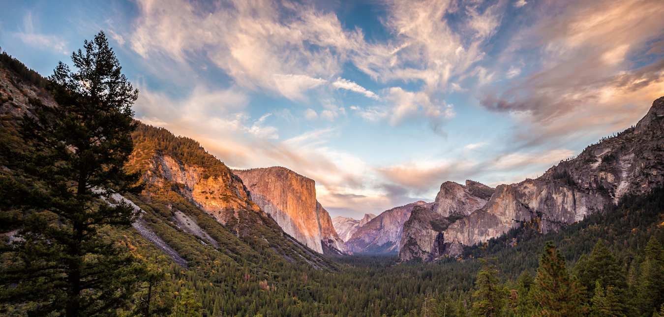Yosemite Valley on a clear day at sunrise or sunset.