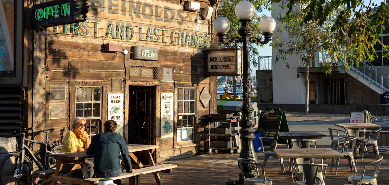 The log cabin exterior of Heinold's First and Last Chance Saloon. 