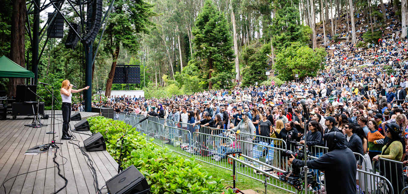 A musician on stage at Stern Grove Music Festival in San Francisco, California.
