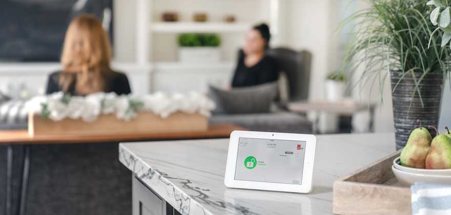 AAA Smart Home Security control panel sitting on a countertop.