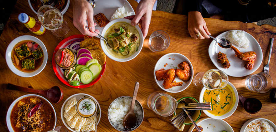 an overhead view of Thai dishes at kin khao, San Francisco