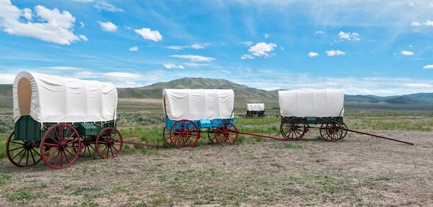 covered wagons lined up at California Trail Interpretive Center in Elko, Nevada.