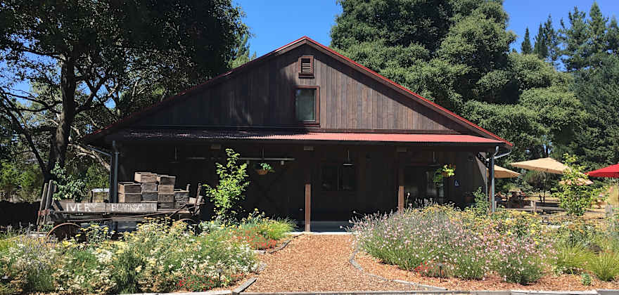 the barn-like exterior of Horse & Plow
