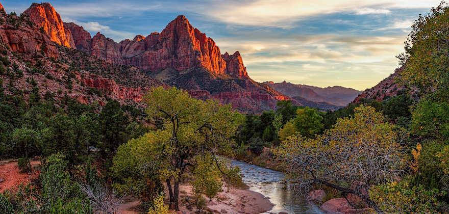 river winds through colorful canyon in Zion National Park, Utah