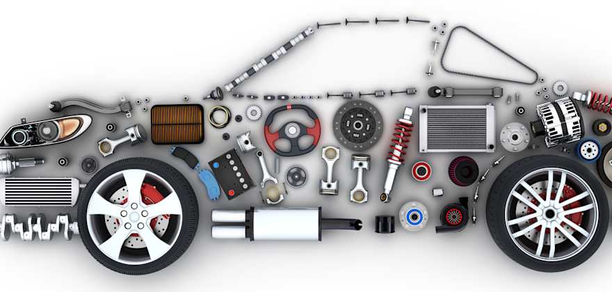 A compilation of original equipment manufacturer or OEM parts in the shape of a car