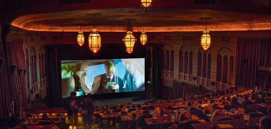 Portland's Bagdad Theater & Pub interior during movie screening