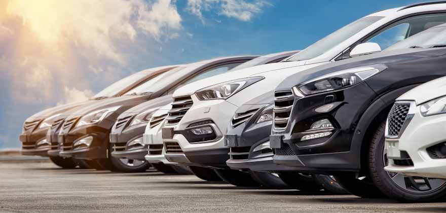 The front of eight cars parked next to each other for comparison