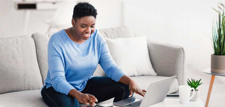 A woman calculates the real cost of using a BNPL app.
