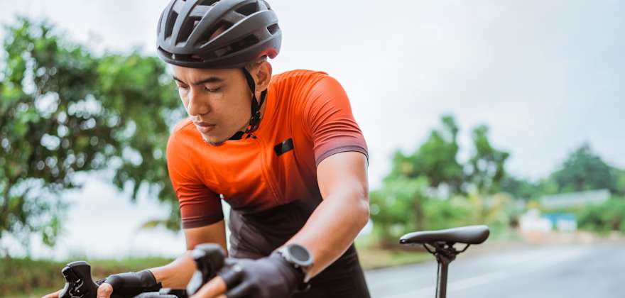 cyclist waits for roadside assistance
