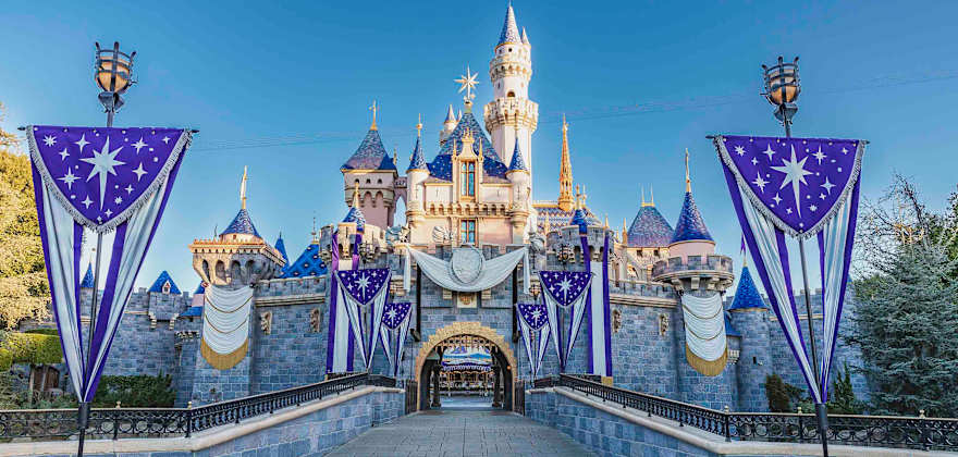 Disneyland castle decorated for Walt Disney 100 anniversary.