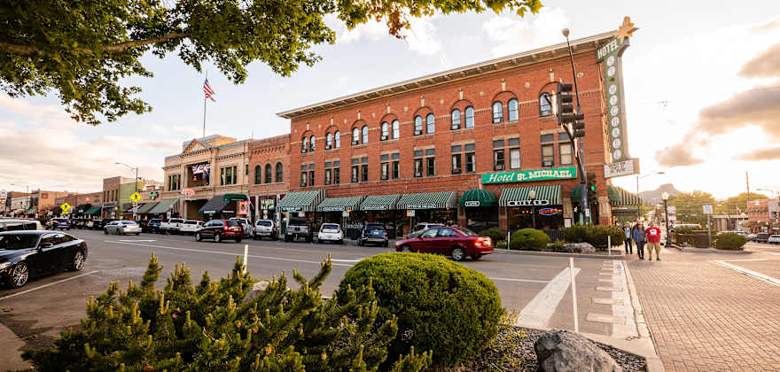 People walk Whiskey Row in Prescott, Arizona.