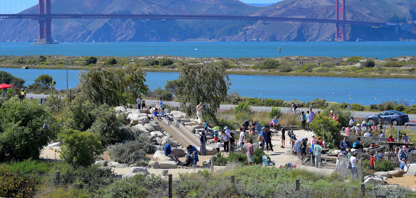 Families play at the Presidio Tunnel Tops in San Francisco, California.