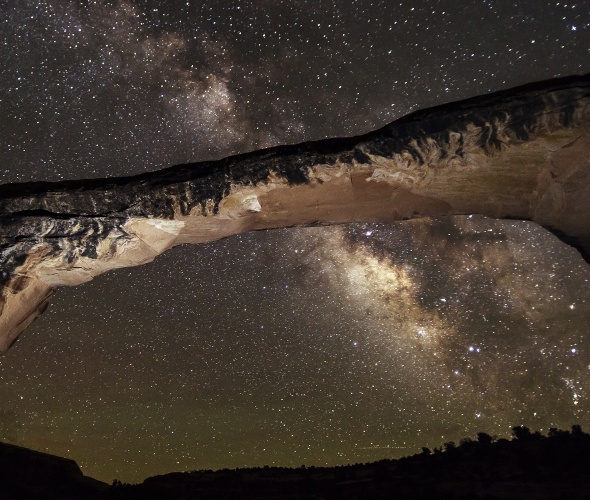 Stars above Natural Bridges National Monument at night, picture
