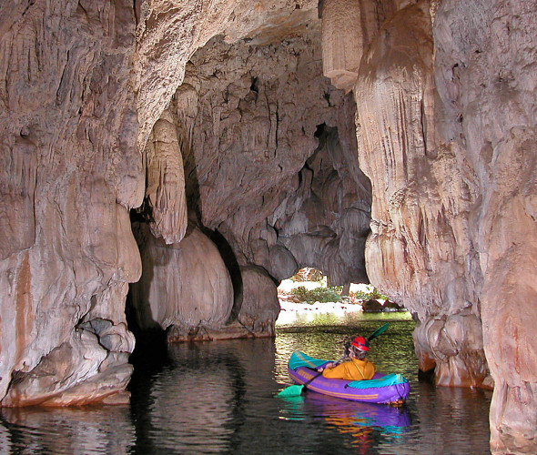 kayaker paddles through underground cave at Natural Bridges near Vallecito, California, picture