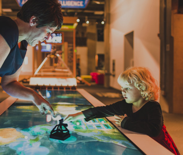 woman and child use interactive exhibit at Living Computers in Seattle, Washington, picture