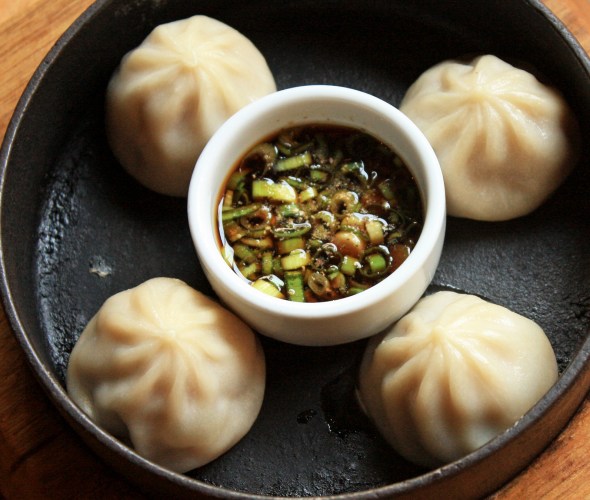 steamed pork dumplings with dipping sauce from Gyoza Bar in Vancouver, B.C.